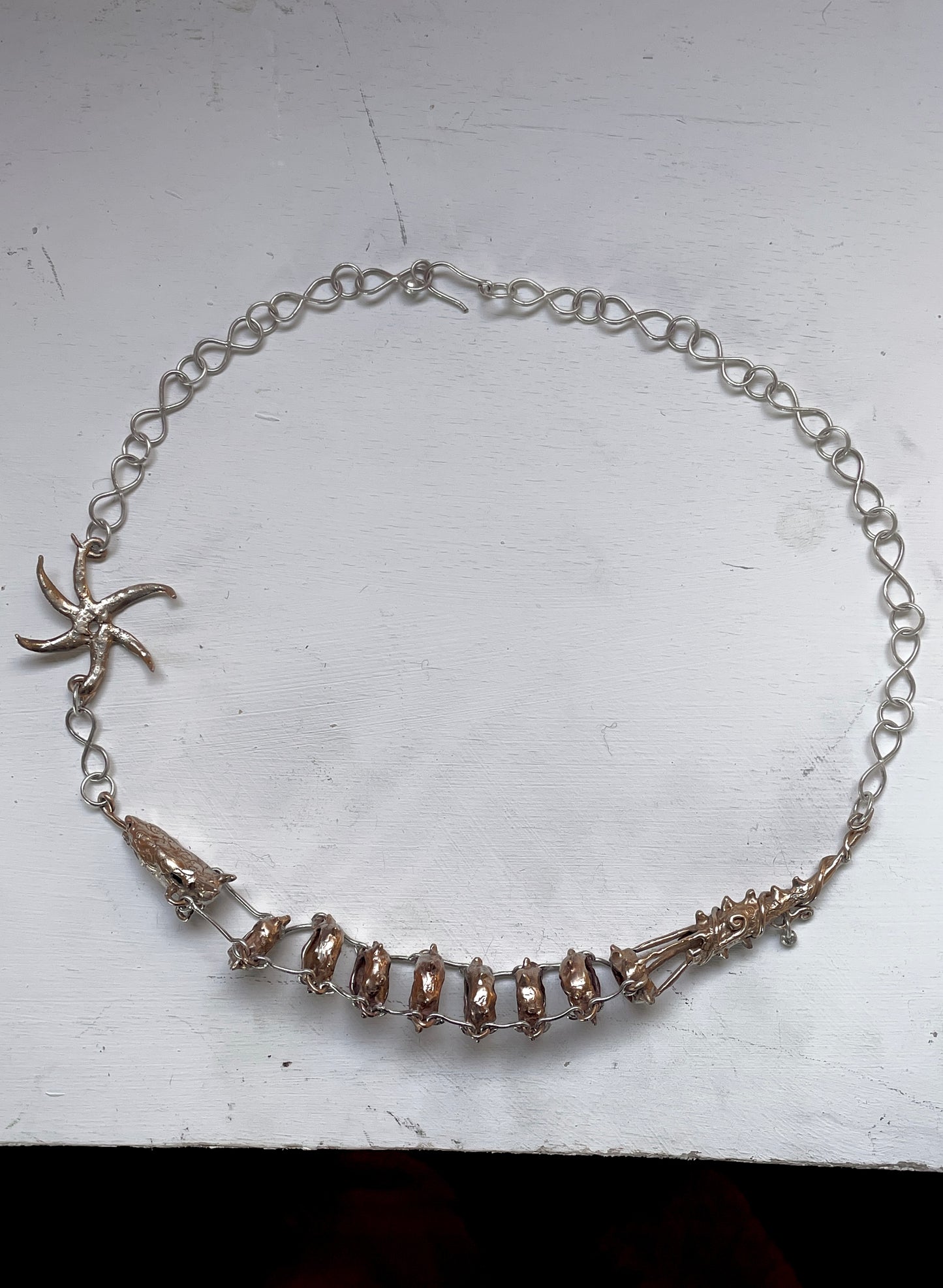 dragon and sun wheel necklace