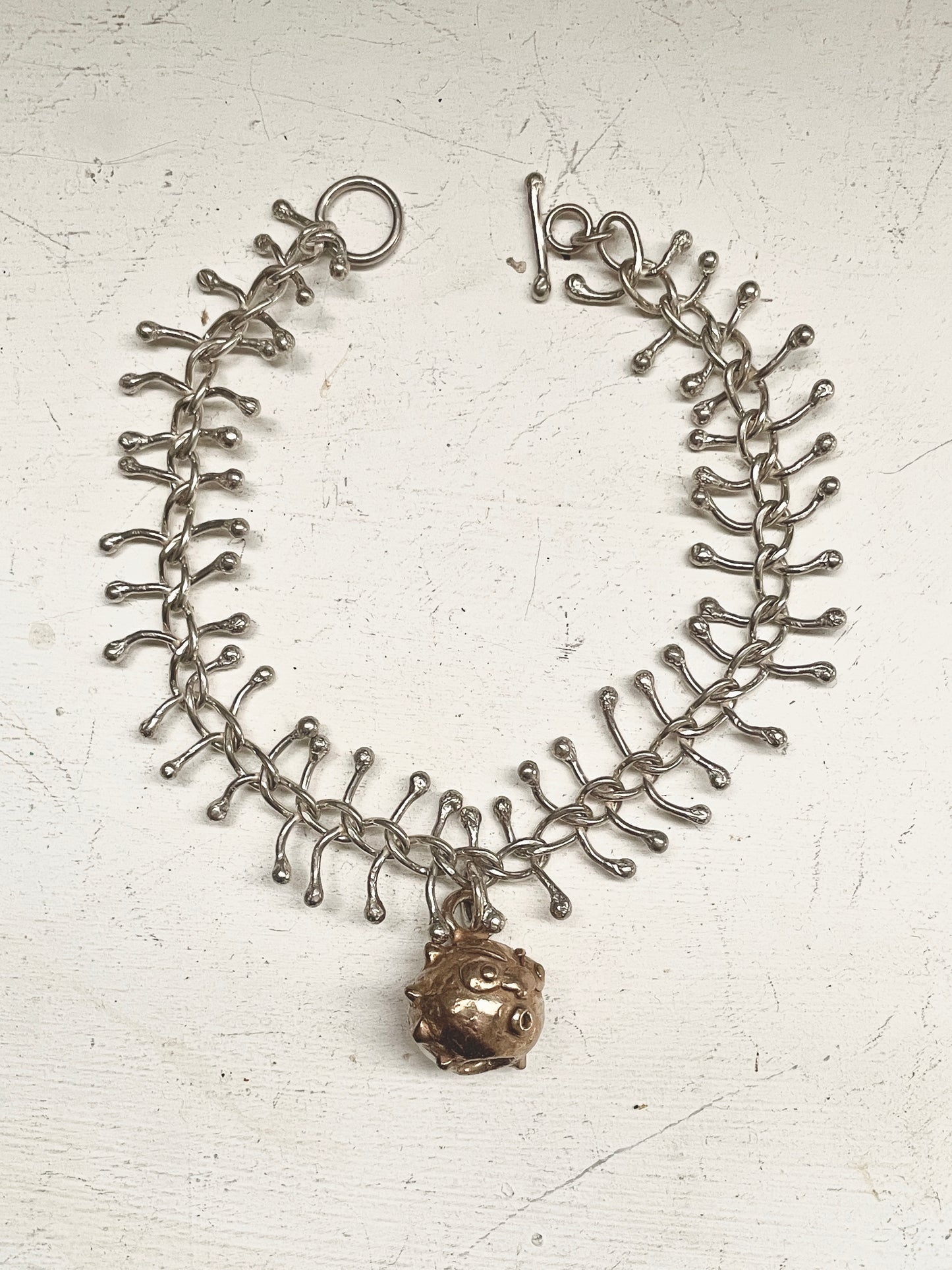 fishbone and goblin bell bracelet