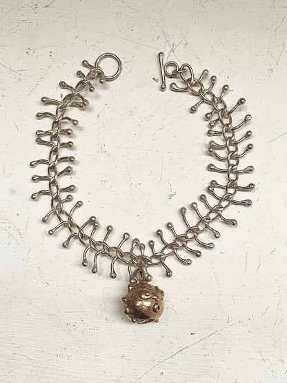 fishbone and goblin bell bracelet