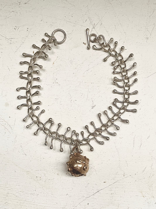 fishbone and goblin bell bracelet