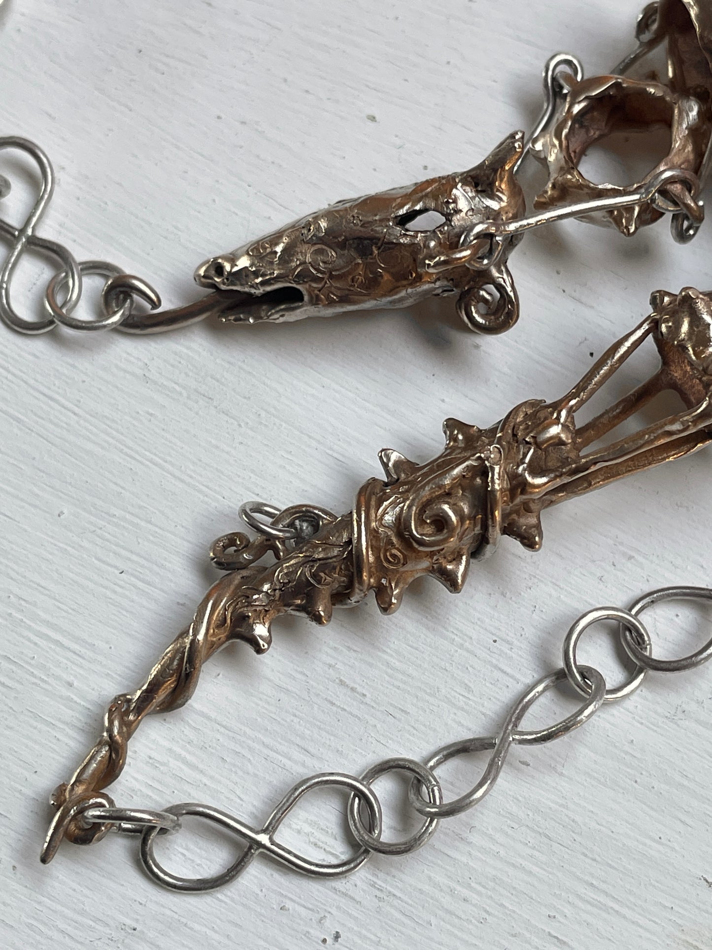 dragon and sun wheel necklace