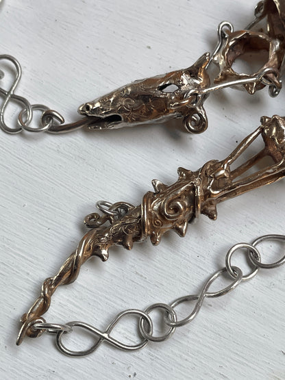 dragon and sun wheel necklace