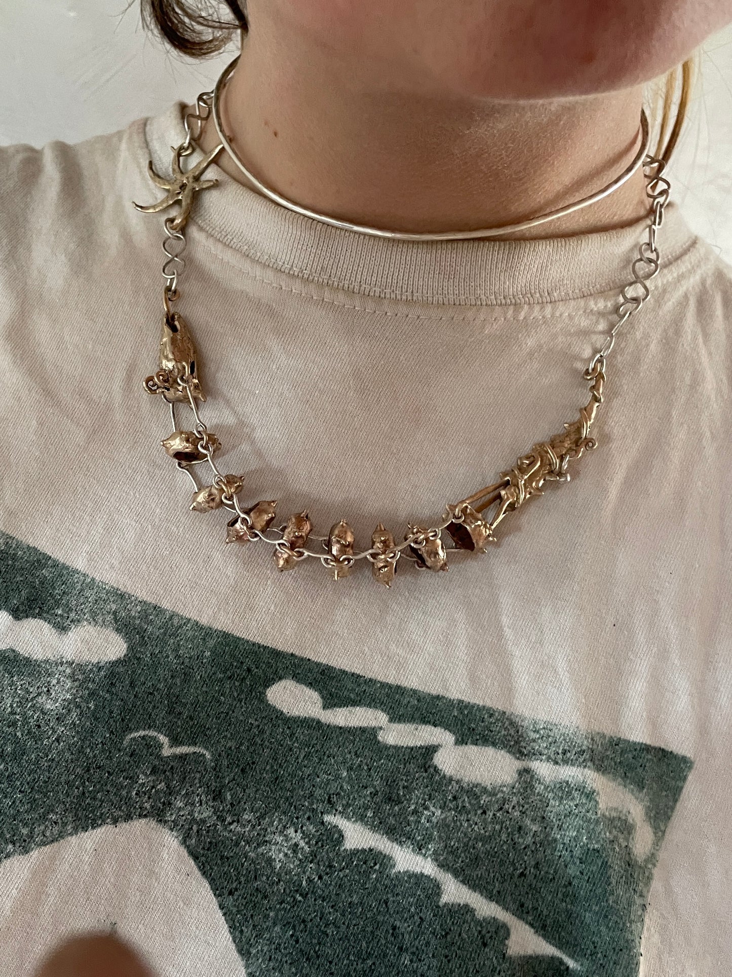 dragon and sun wheel necklace