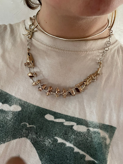 dragon and sun wheel necklace