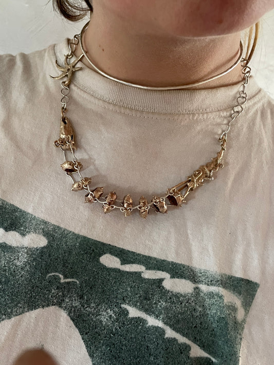 dragon and sun wheel necklace